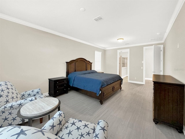 bedroom with visible vents, baseboards, light wood-style flooring, and crown molding