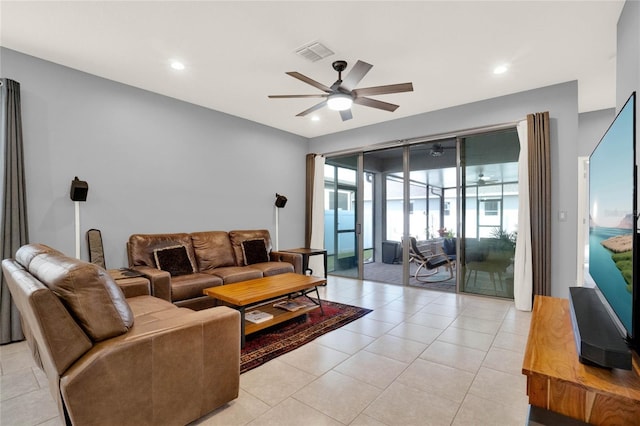living room with light tile patterned flooring, visible vents, recessed lighting, and a ceiling fan