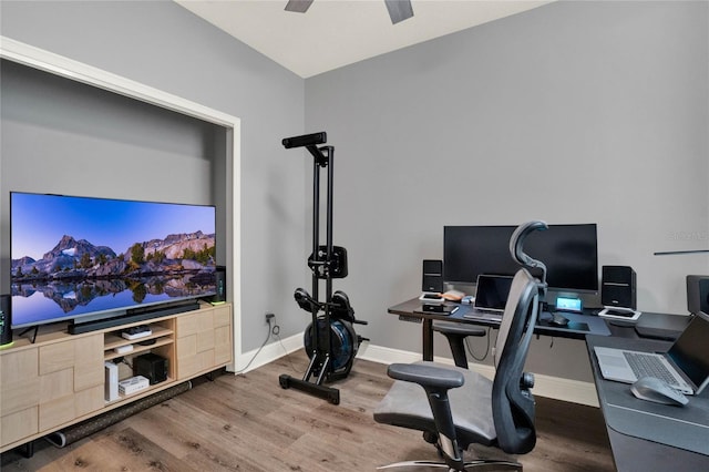 office space with ceiling fan, baseboards, and wood finished floors
