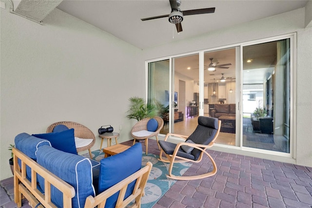 view of patio / terrace with a ceiling fan