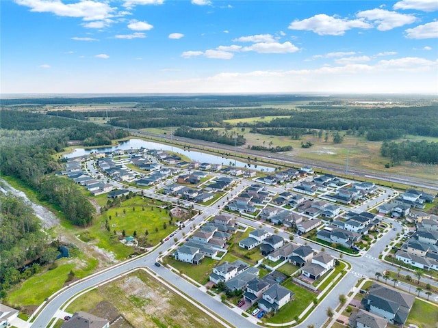 aerial view featuring a residential view and a water view