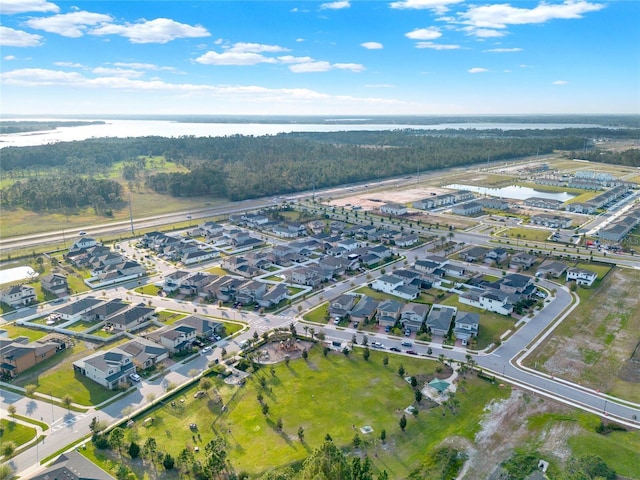 aerial view featuring a residential view and a water view
