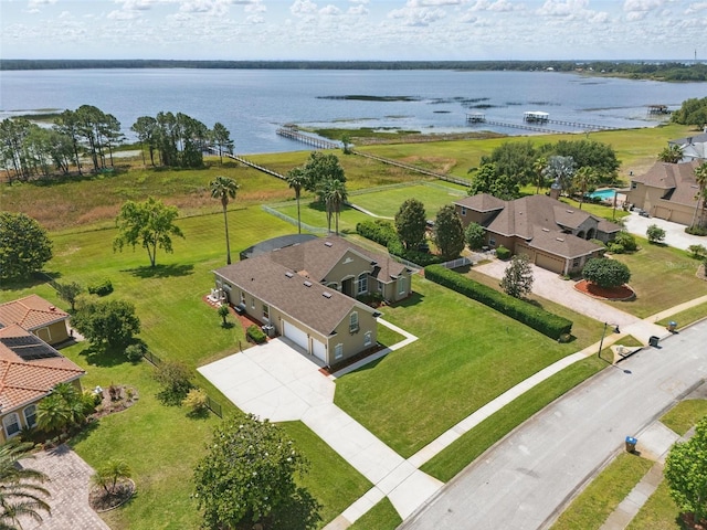 aerial view featuring a water view and a residential view