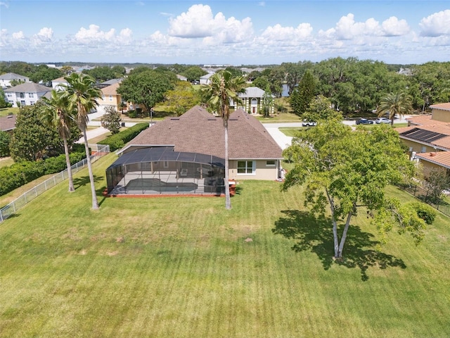 birds eye view of property with a residential view