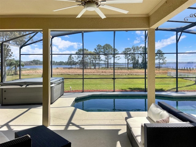 sunroom featuring a jacuzzi, a water view, a swimming pool, and a ceiling fan