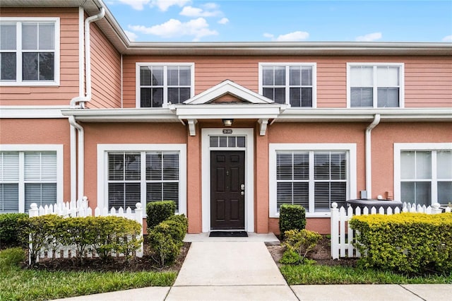 view of front of home featuring stucco siding