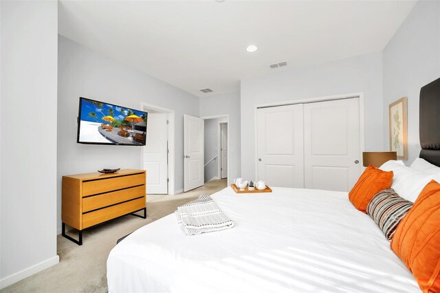 2619 Corvette Ln, Kissimmee, FL 34746 - bedroom featuring light colored carpet, visible vents, and a closet