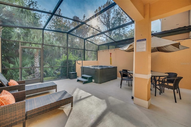 2619 Corvette Ln, Kissimmee, FL 34746 - view of patio / terrace with outdoor dining area, a lanai, and a hot tub
