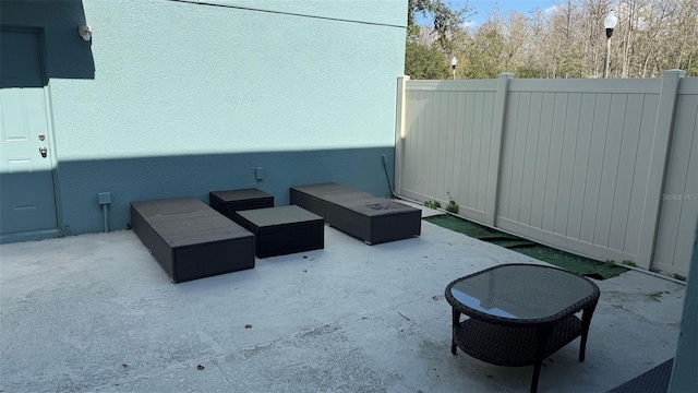 10197 Ridgebloom Ave, Orlando, FL 32829 - view of patio / terrace with a fenced backyard
