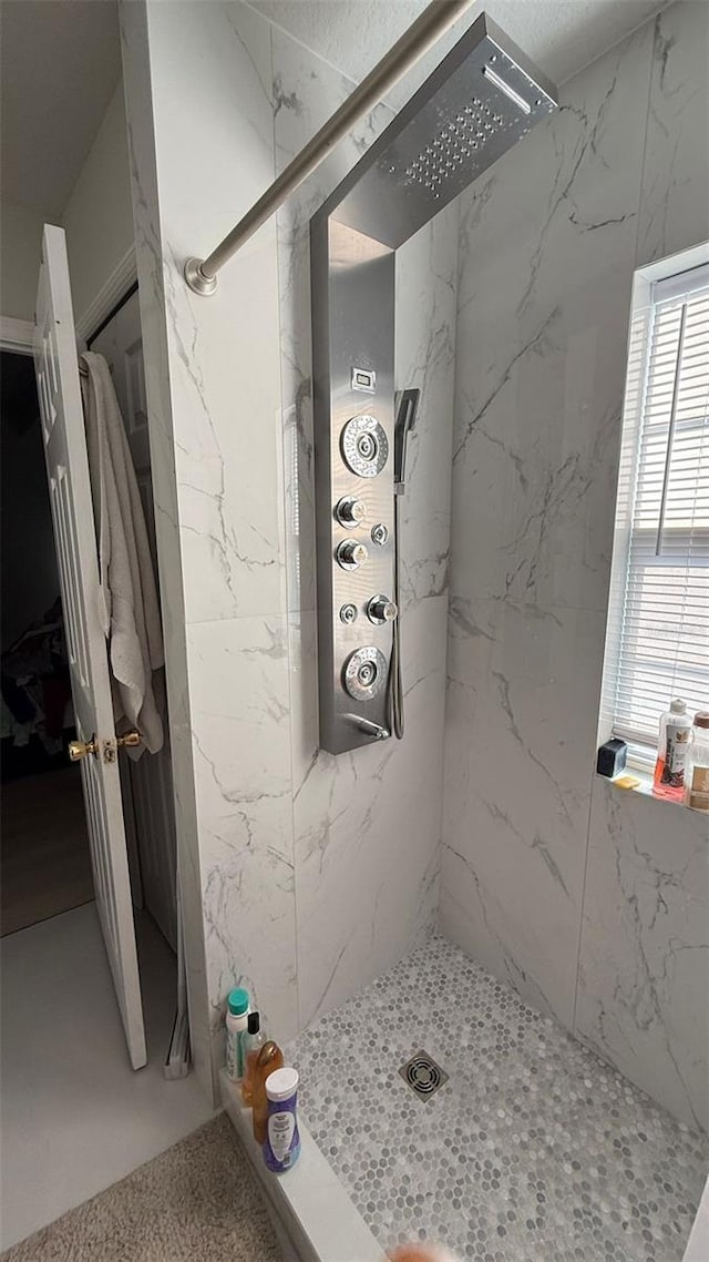 10197 Ridgebloom Ave, Orlando, FL 32829 - full bathroom with a marble finish shower