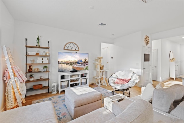 1153 Augustus Dr, Davenport, FL 33896 - living room featuring visible vents and light wood-type flooring