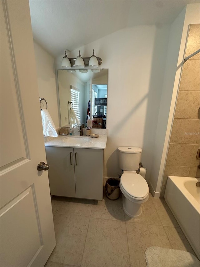 12673 Yoshino Aly, Orlando, FL 32827 - bathroom with tile patterned floors, toilet, tub / shower combination, baseboards, and vanity