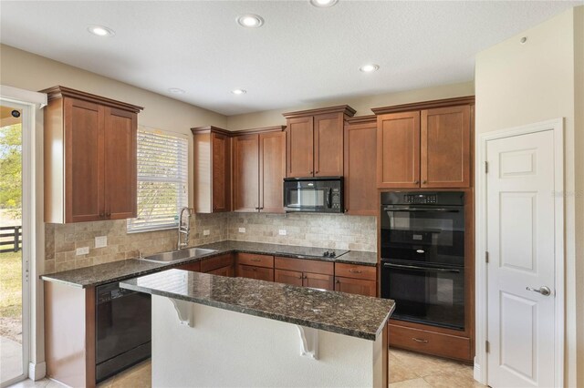 30439 Gidran Ter, Mount Dora, FL 32757 - kitchen featuring a sink, dark stone countertops, black appliances, and decorative backsplash