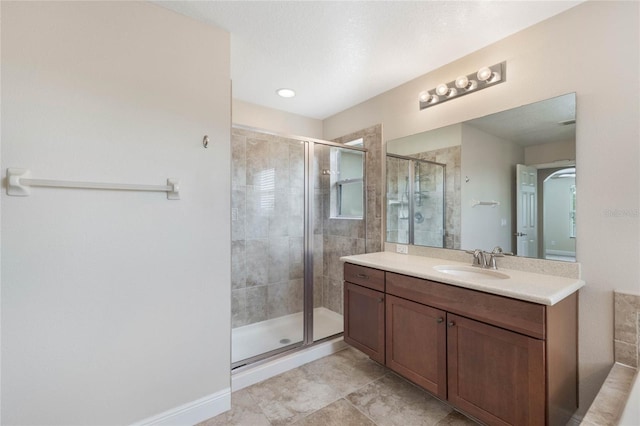 30439 Gidran Ter, Mount Dora, FL 32757 - full bathroom featuring a shower stall, baseboards, and vanity