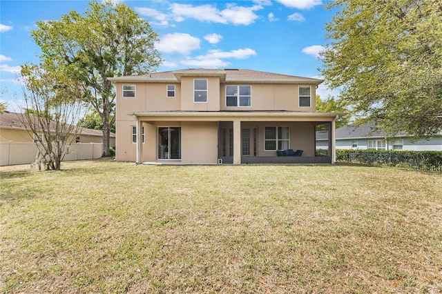 30439 Gidran Ter, Mount Dora, FL 32757 - back of house featuring a fenced backyard, stucco siding, and a yard