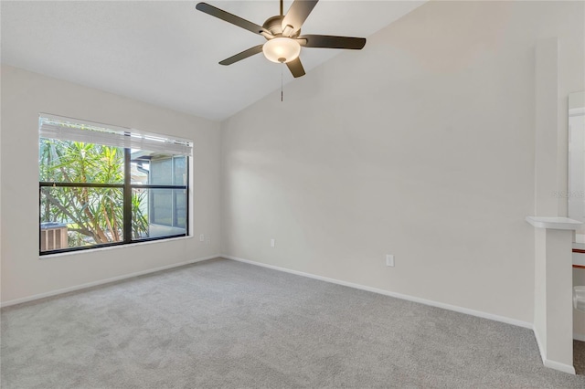 2435 King Oak Ln, Saint Cloud, FL 34769 - carpeted spare room with baseboards, ceiling fan, and vaulted ceiling
