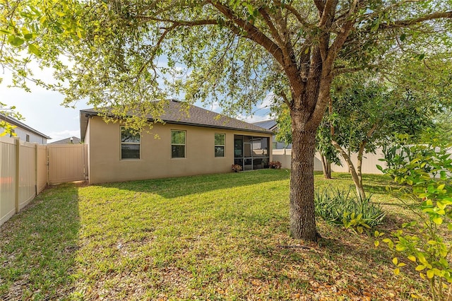 exterior space featuring a fenced backyard