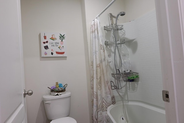 full bathroom featuring shower / tub combo with curtain and toilet