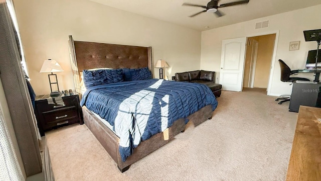 bedroom featuring carpet, ceiling fan, and visible vents