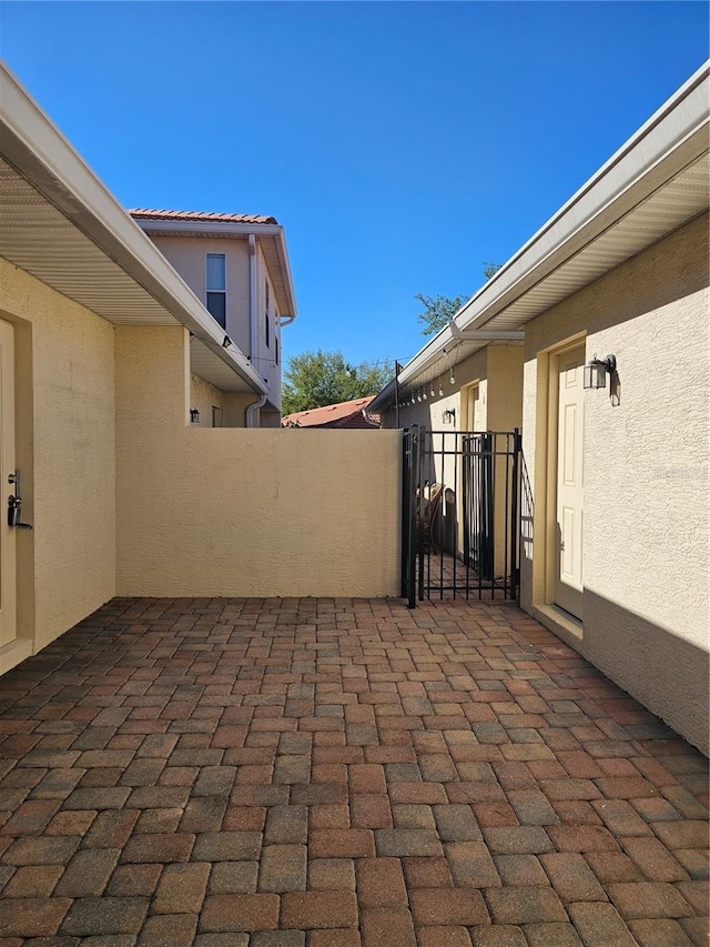 2921 Puerta Del Sol Blvd, Kissimmee, FL 34744 - view of patio with fence
