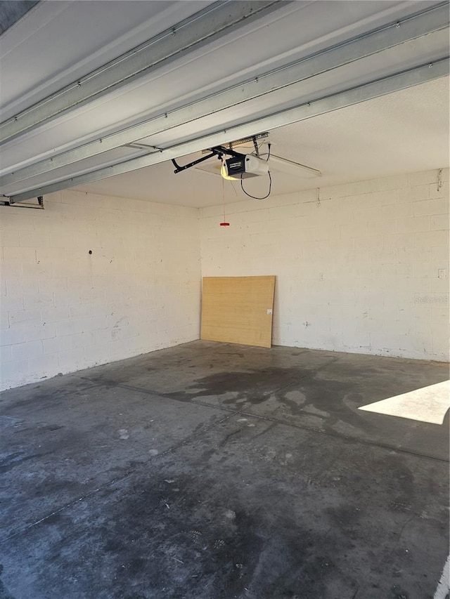 2921 Puerta Del Sol Blvd, Kissimmee, FL 34744 - garage featuring a garage door opener