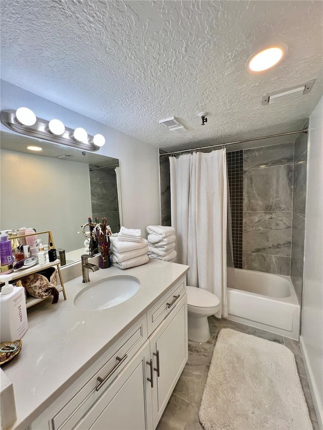full bathroom featuring shower / bath combination with curtain, a textured ceiling, vanity, visible vents, and toilet