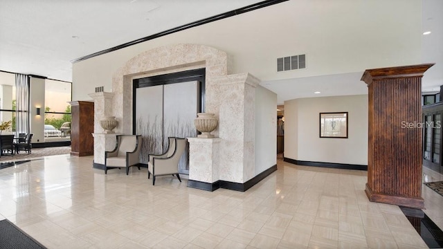 building lobby featuring visible vents