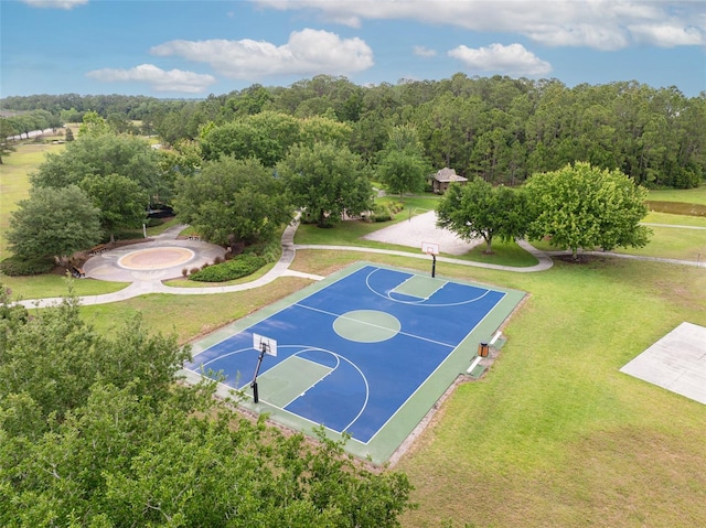 view of basketball court featuring community basketball court and a yard
