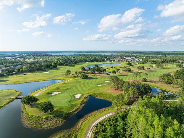 aerial view featuring view of golf course and a water view