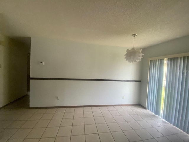 empty room with a textured ceiling
