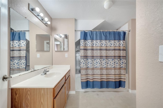4561 Yellowgold Rd E Unit 107, Kissimmee, FL 34746 - bathroom with shower / bath combination with curtain, vanity, a textured wall, and a textured ceiling