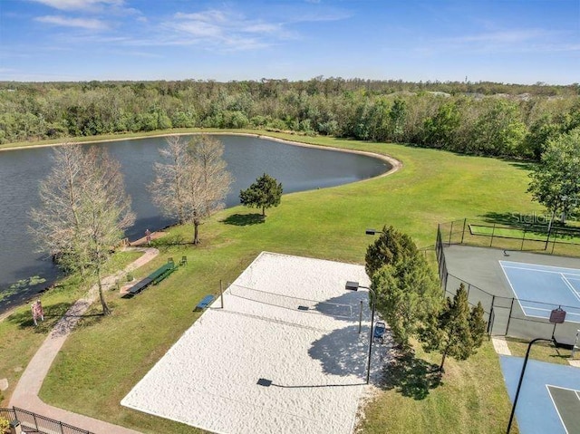 4561 Yellowgold Rd E Unit 107, Kissimmee, FL 34746 - drone / aerial view featuring a wooded view and a water view