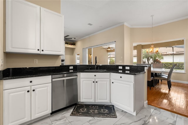 3637 Rothbury Dr, Belle Isle, FL 32812 - kitchen featuring a sink, dishwasher, marble finish floor, ceiling fan with notable chandelier, and white cabinetry