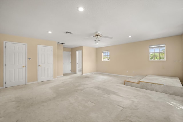 3637 Rothbury Dr, Belle Isle, FL 32812 - spare room featuring light colored carpet, a ceiling fan, baseboards, recessed lighting, and visible vents