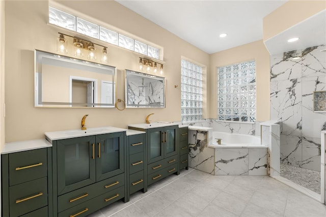 3637 Rothbury Dr, Belle Isle, FL 32812 - bathroom with recessed lighting, a bath, two vanities, a sink, and a marble finish shower