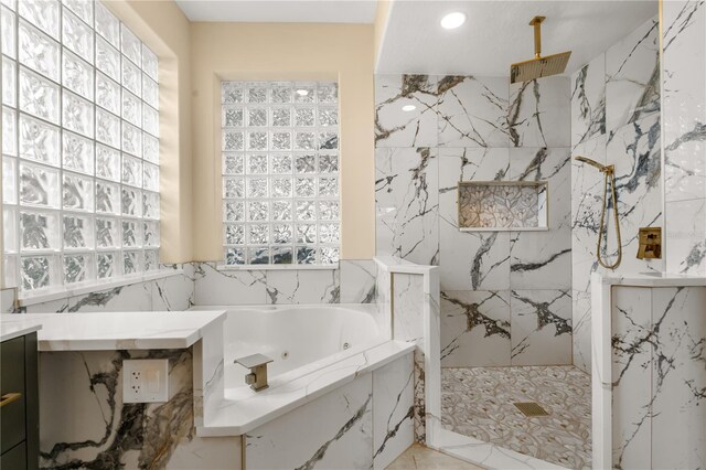 3637 Rothbury Dr, Belle Isle, FL 32812 - full bathroom featuring a whirlpool tub, a healthy amount of sunlight, and a marble finish shower