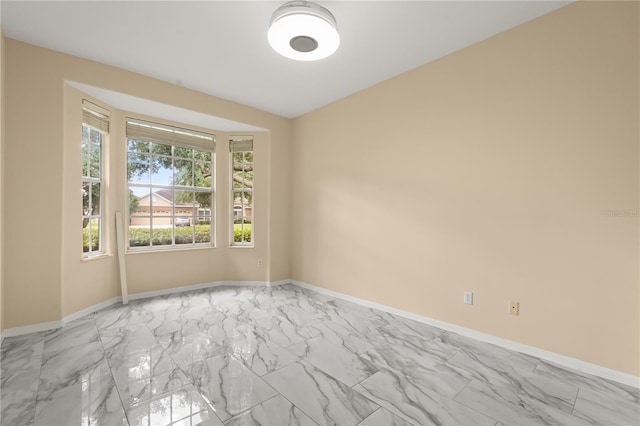 3637 Rothbury Dr, Belle Isle, FL 32812 - empty room with baseboards and marble finish floor
