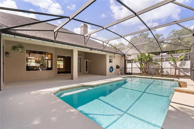 3637 Rothbury Dr, Belle Isle, FL 32812 - view of swimming pool featuring a fenced in pool, a lanai, and a patio area