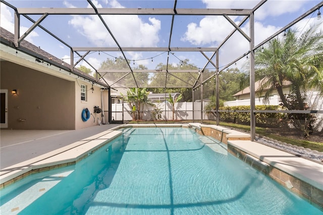 3637 Rothbury Dr, Belle Isle, FL 32812 - view of swimming pool featuring a fenced in pool, glass enclosure, a patio area, and fence