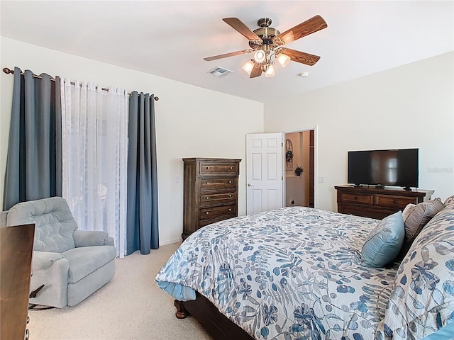 501 Heartwell Dr, Poinciana, FL 34759 - carpeted bedroom with visible vents and a ceiling fan