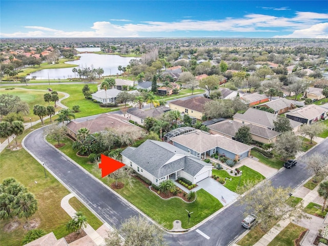 501 Heartwell Dr, Poinciana, FL 34759 - drone / aerial view featuring a water view and a residential view