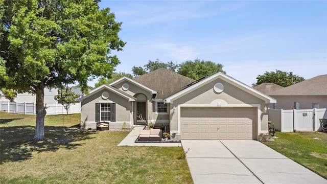 323 Azincourt Ln, Kissimmee, FL 34759 - ranch-style house featuring a front lawn, driveway, stucco siding, and fence