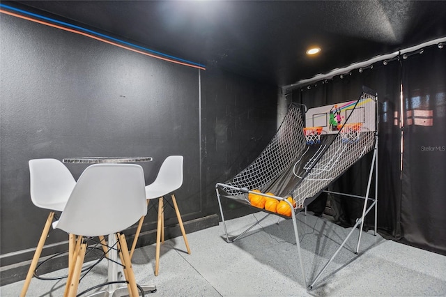 recreation room with recessed lighting