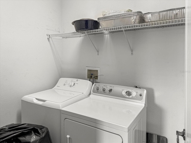 7733 Beridale Ct, Orlando, FL 32818 - laundry area featuring washing machine and clothes dryer and laundry area