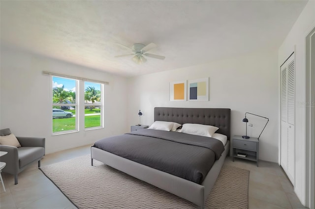554 NW Twylite Ter, Port St Lucie, FL 34983 - bedroom with light tile patterned flooring and a ceiling fan