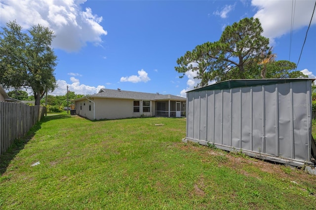 554 NW Twylite Ter, Port St Lucie, FL 34983 - view of yard featuring a sunroom