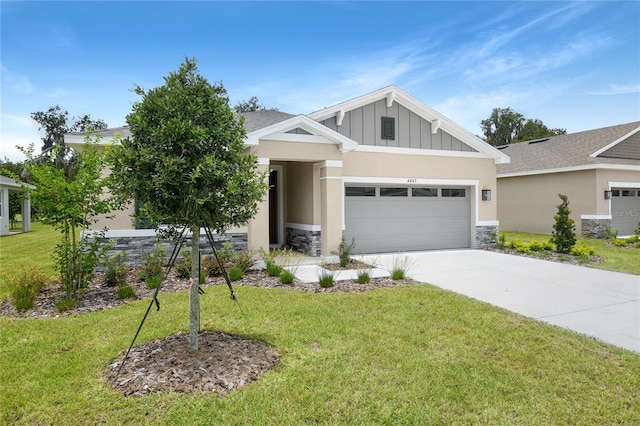 4083 Bannock Ave, Tavares, FL 32778 - craftsman-style house featuring stone siding, an attached garage, concrete driveway, a front yard, and stucco siding