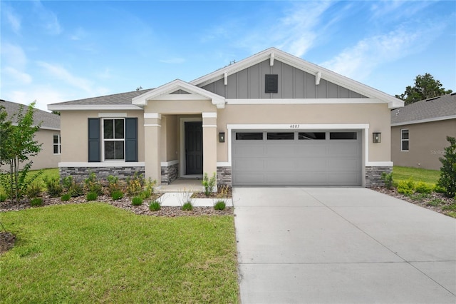 4083 Bannock Ave, Tavares, FL 32778 - craftsman-style house with stone siding, driveway, a front yard, an attached garage, and stucco siding