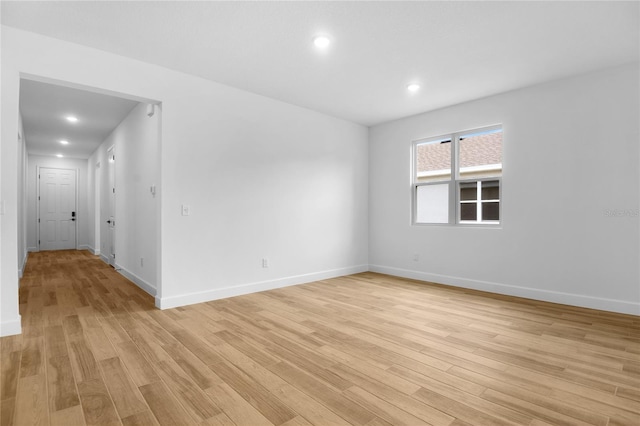 4083 Bannock Ave, Tavares, FL 32778 - empty room with light wood finished floors and recessed lighting