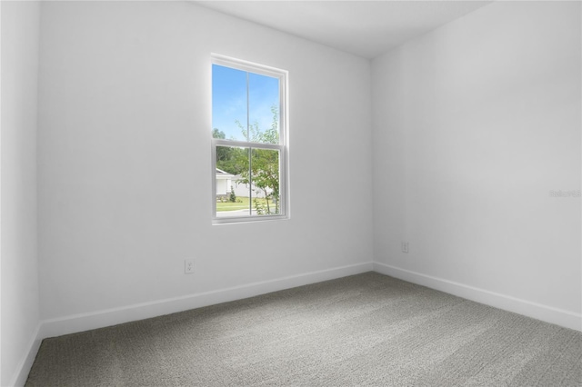 4083 Bannock Ave, Tavares, FL 32778 - carpeted spare room with baseboards